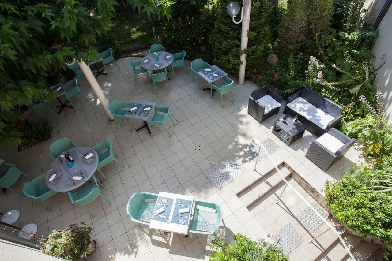 Hotel Le Lion D'Or Manzac-sur-Vern Exterior foto